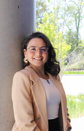 A woman wearing a suit jacket