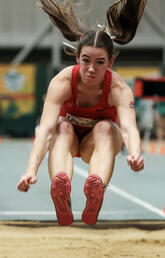 A woman doing long jumo
