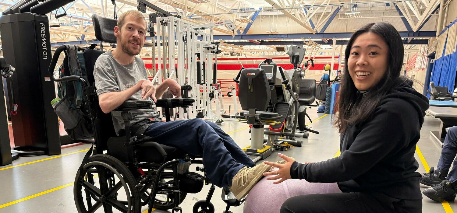 Two people working in a physical rehab facility