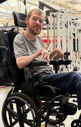 Two people working in a physical rehab facility