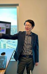 Dr. Winson Cheung and research assistant Dewuni De Silva in Oncology Outcomes lab